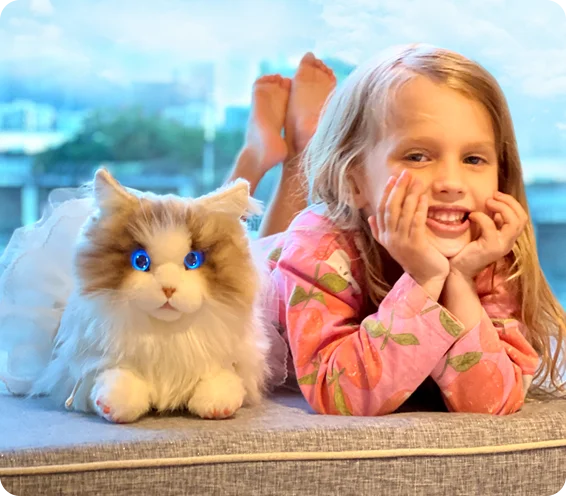 metaCat Ragdoll robot cat placed next to a child, showing full-body appearance