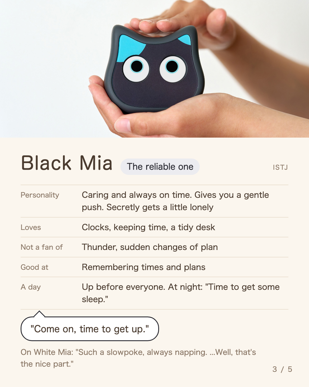 Black Mia held in two hands, and Black Mia's profile