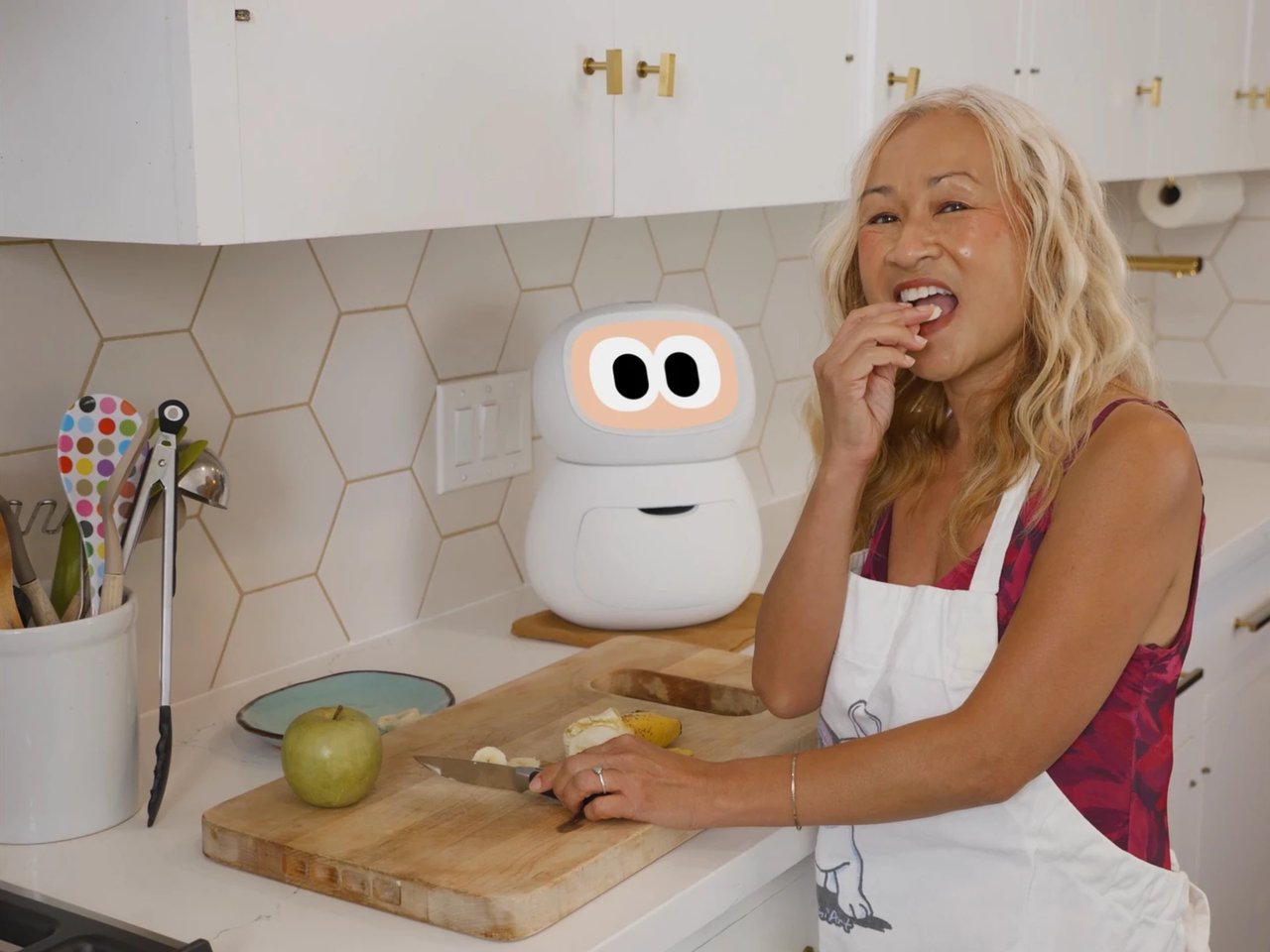 Rhem chatting with a user in the kitchen